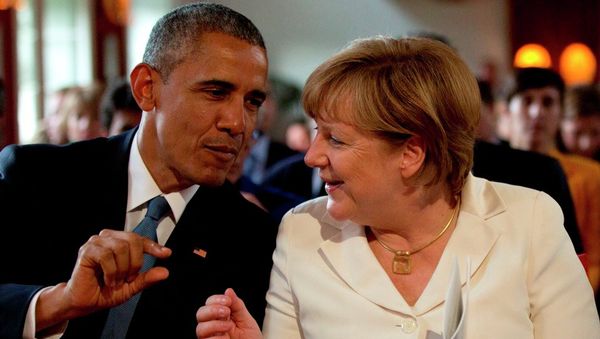 German Chancellor Angela Merkel, right, speaks with US President Barack Obama during the G-7 summit German Chancellor Angela Merkel, right, speaks with US President Barack Obama during the G-7 summit - Sputnik International
