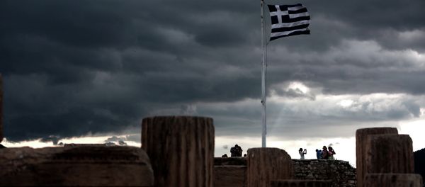 A Greek flag waves in the breeze at Acropolis hill, in Athens on June 5, 2015 A Greek flag waves in the breeze at Acropolis hill, in Athens on June 5, 2015 - Sputnik International
