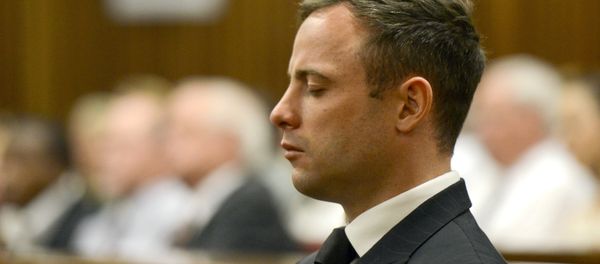Paralympian Oscar Pistorius is seen during his sentencing for the killing of his girlfriend Reeva Steenkamp at the high court in Pretoria, on October 21, 2014 - Sputnik International
