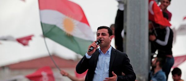 Selahattin Demirtas, co-chair of the pro-Kurdish Peoples' Democratic Party (HDP), delivers a speech from the top of his election campaign bus at a rally in Istanbul, Turkey, Saturday, June 6, 2015. - Sputnik International