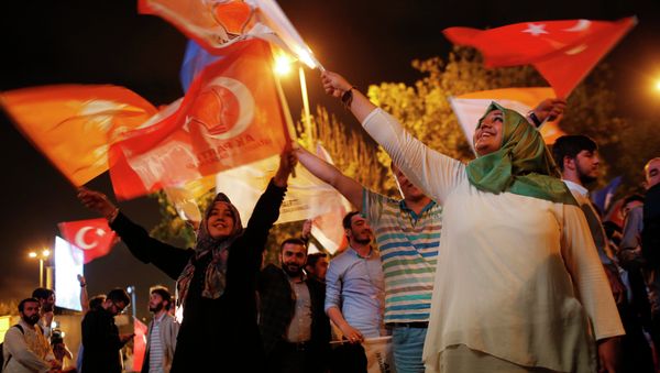 Supporters of Turkey's ruling Justice and Development Party celebrate after the election results in Istanbul, Turkey, late Sunday, June 7, 2015 Supporters of Turkey's ruling Justice and Development Party celebrate after the election results in Istanbul, Turkey, late Sunday, June 7, 2015 - Sputnik International
