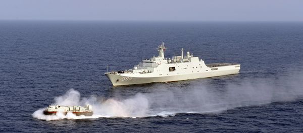 China's amphibious ship Jinggangshan is seen during a coordination training with a hovercraft in waters near south China's Hainan Province in the South China Sea. China's amphibious ship Jinggangshan is seen during a coordination training with a hovercraft in waters near south China's Hainan Province in the South China Sea. - Sputnik International