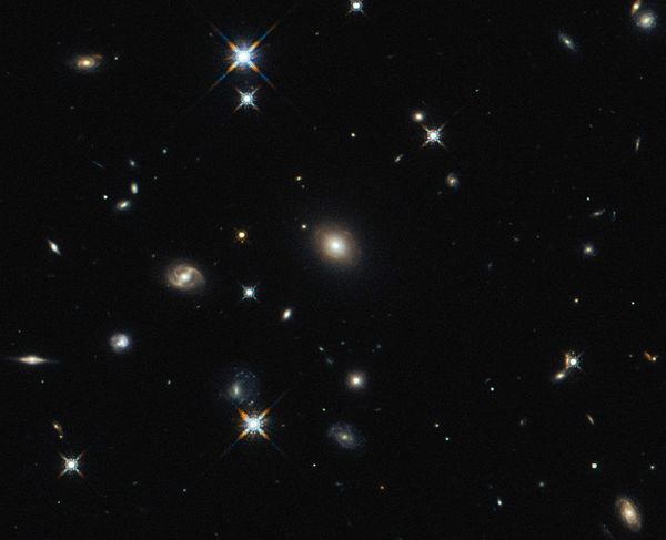 The image shows the foreground lensing galaxy (observed with Hubble), and the gravitationally lensed galaxy SDP.81, which forms an almost perfect Einstein Ring, is hardly visible. - Sputnik International