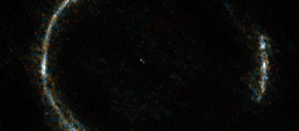 The gravitationally lensed galaxy SDP.81, which appears as an almost perfect Einstein Ring, is seen here. - Sputnik International
