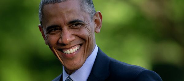 President Barack Obama smiles as he walks across the South Lawn to the White House from Marine One, Wednesday, May 20, 2015, in Washington - Sputnik International