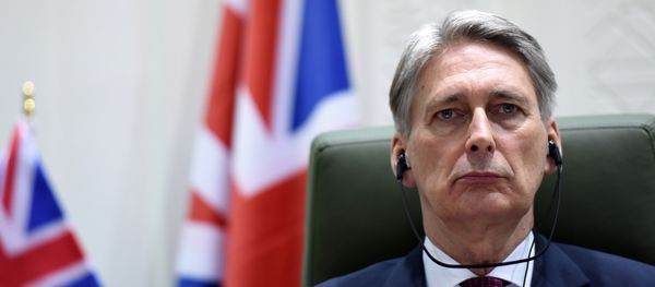 British Foreign Secretary Philip Hammond listens during a joint press conference with Saudi Foreign Minister Prince Saud bin al-Faisal bin Abdulaziz (not pictured) after a meeting on March 23, 2015 in Riyadh British Foreign Secretary Philip Hammond listens during a joint press conference with Saudi Foreign Minister Prince Saud bin al-Faisal bin Abdulaziz (not pictured) after a meeting on March 23, 2015 in Riyadh - Sputnik International