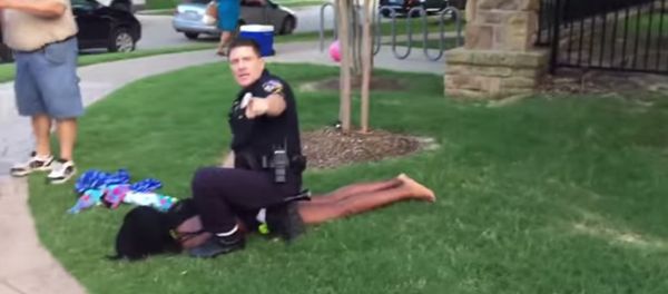 Former McKinney, Texas Police Officer Eric Casebolt restrains a teenage girl at a pool party on Friday June 5, 2015. Former McKinney, Texas Police Officer Eric Casebolt restrains a teenage girl at a pool party on Friday June 5, 2015. - Sputnik International