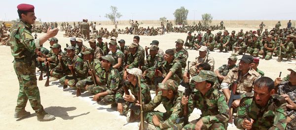 Iraqi Sunni volunteers from the Anbar province, who joined Iraq's Popular Mobilisation force as part of government efforts to make the fight against the Islamic State (IS) group a cross-sectarian drive, take part in their first training session at a training base in Amriyat al-Fallujah, on May 8, 2015 Iraqi Sunni volunteers from the Anbar province, who joined Iraq's Popular Mobilisation force as part of government efforts to make the fight against the Islamic State (IS) group a cross-sectarian drive, take part in their first training session at a training base in Amriyat al-Fallujah, on May 8, 2015 - Sputnik International