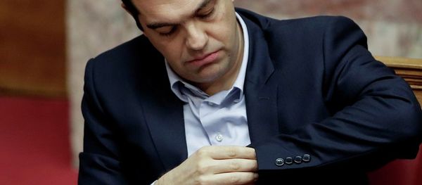 Greece's Prime Minister Alexis Tsipras looks at his watch during a parliament session in Athens, Greece's Prime Minister Alexis Tsipras looks at his watch during a parliament session in Athens, - Sputnik International