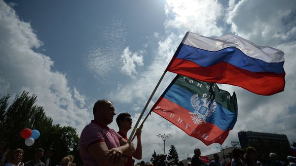 Participants at the rally in support of the Donetsk People's Republic on Lenin Square in Donetsk Participants at the rally in support of the Donetsk People's Republic on Lenin Square in Donetsk - Sputnik International
