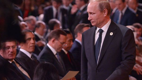Russia's President Vladimir Putin (R) arrives as (L-R) Canada's Prime Minister Stephen Harper and US President Barack Obama look on during the 2014 G20 Summit.file photo Russia's President Vladimir Putin (R) arrives as (L-R) Canada's Prime Minister Stephen Harper and US President Barack Obama look on during the 2014 G20 Summit.file photo - Sputnik International