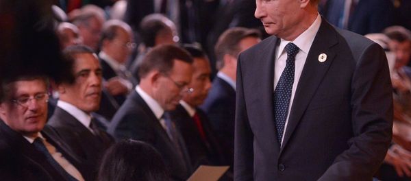 Russia's President Vladimir Putin (R) arrives as (L-R) Canada's Prime Minister Stephen Harper and US President Barack Obama look on during the 2014 G20 Summit.file photo - Sputnik International