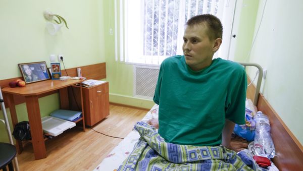 A man, who according to Ukraine's state security service (SBU) is named Alexander Alexandrov and is one of two Russian servicemen recently detained by Ukrainian forces, speaks during an interview with Reuters at a hospital in Kiev, Ukraine, May 28, 2015 A man, who according to Ukraine's state security service (SBU) is named Alexander Alexandrov and is one of two Russian servicemen recently detained by Ukrainian forces, speaks during an interview with Reuters at a hospital in Kiev, Ukraine, May 28, 2015 - Sputnik International