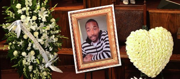 (FILES) In this August 30, 2014 file photo, a photo of Ezell Ford is seen at his funeral service at the First AME Church in Los Angeles (FILES) In this August 30, 2014 file photo, a photo of Ezell Ford is seen at his funeral service at the First AME Church in Los Angeles - Sputnik International