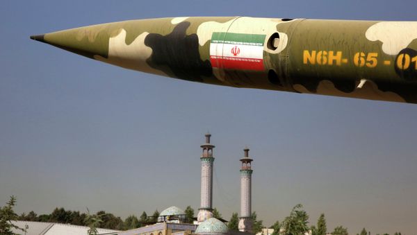 A missile is displayed at an exhibition on the 1980-88 Iran-Iraq war, at a park, northern Tehran, Iran, Thursday, Sept. 25, 2014 A missile is displayed at an exhibition on the 1980-88 Iran-Iraq war, at a park, northern Tehran, Iran, Thursday, Sept. 25, 2014 - Sputnik International