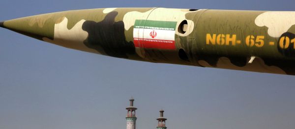 A missile is displayed at an exhibition on the 1980-88 Iran-Iraq war, at a park, northern Tehran, Iran, Thursday, Sept. 25, 2014 - Sputnik International