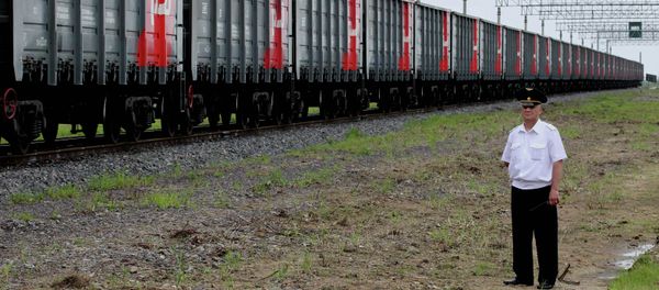 The first freight train crosses the new railway checkpoint between the Russian station Makhalino and Chinese station Hunchun, Jilin province. The first freight train crosses the new railway checkpoint between the Russian station Makhalino and Chinese station Hunchun, Jilin province. - Sputnik International