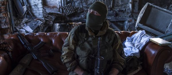 Donbass militiaman rests at his position inside the Donetsk airport, eastern Ukraine. June 9, 2015. Donbass militiaman rests at his position inside the Donetsk airport, eastern Ukraine. June 9, 2015. - Sputnik International