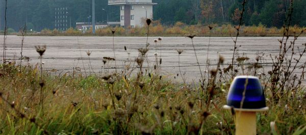 The overgrown runway of an airstrip used by the CIA to covertly bring detainees into Poland. - Sputnik International