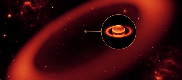 An artist’s illustration shows the grand scale of the Phoebe ring, with Saturn at its center. - Sputnik International