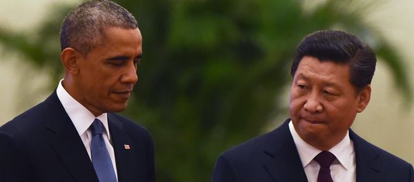 US President Barack Obama (L) walks with Chinese President Xi Jinping - Sputnik International
