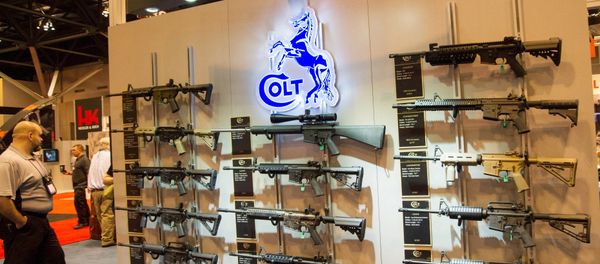 A wall of Colt M4 Carbines in various configurations are displayed at the National Rifle Association (NRA) Annual Meetings and Exhibits on April 14, 2012 in St. Louis, Missouri A wall of Colt M4 Carbines in various configurations are displayed at the National Rifle Association (NRA) Annual Meetings and Exhibits on April 14, 2012 in St. Louis, Missouri - Sputnik International