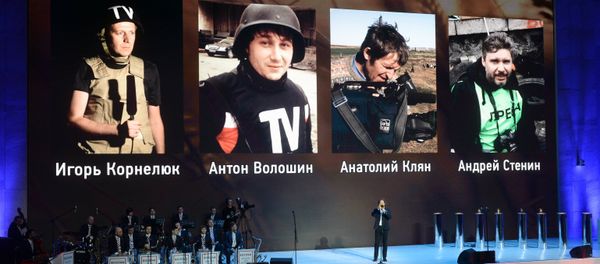 Journalists killed in the Ukrainian conflict are remembered at the MEDIA ACE 2015 press festival held by the Russian Defense Ministry in Moscow - Sputnik International