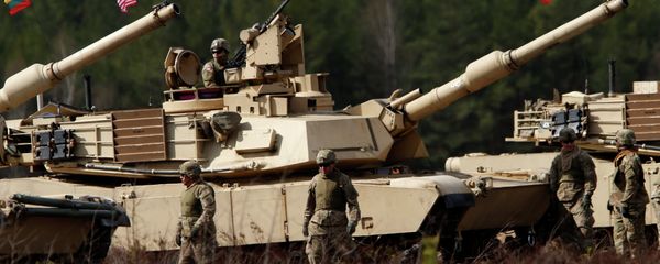 U.S. soldiers from the 2nd Battalion, 1st Brigade Combat Team, 3rd Infantry Division at the M1A2 Abrams battle tank during a military exercise at the Gaiziunu Training Range in Pabrade some 60km.(38 miles) north of the capital Vilnius, Lithuania, Thursday, April 9, 2015 U.S. soldiers from the 2nd Battalion, 1st Brigade Combat Team, 3rd Infantry Division at the M1A2 Abrams battle tank during a military exercise at the Gaiziunu Training Range in Pabrade some 60km.(38 miles) north of the capital Vilnius, Lithuania, Thursday, April 9, 2015 - Sputnik International