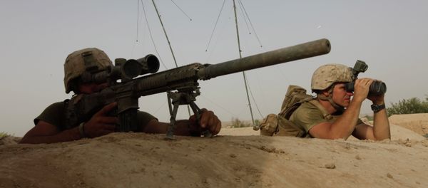 US Marine Corps snipers look for the enemy during an exchange of fire with Taliban militants in Afghanistan in August 2011. US Marine Corps snipers look for the enemy during an exchange of fire with Taliban militants in Afghanistan in August 2011. - Sputnik International