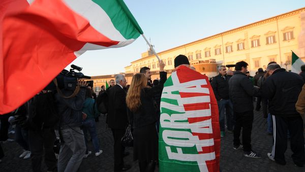 Right-wing supporters wave Italian flags in front of the Quirinale, the presidential palace where formal consultations ahead of the formation of a new cabinet take place on November 13, 2011 in Rome Right-wing supporters wave Italian flags in front of the Quirinale, the presidential palace where formal consultations ahead of the formation of a new cabinet take place on November 13, 2011 in Rome - Sputnik International