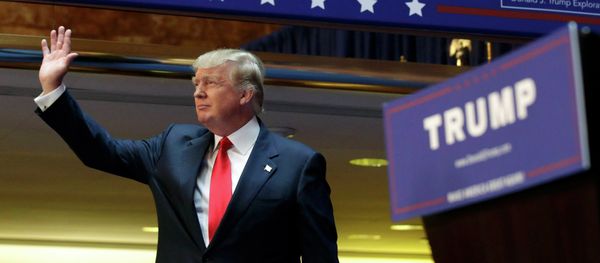 US Republican presidential candidate, real estate mogul and TV personality Donald Trump, acknowledges supporters prior to formally announcing his campaign for the 2016 Republican presidential nomination during an event at Trump Tower in New York June 16, 2015 - Sputnik International