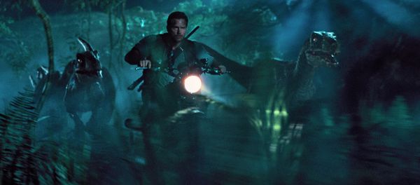 This photo, provided by Universal Pictures, shows Chris Pratt as Owen leading the raptors on a mission in a scene from the film Jurassic World. - Sputnik International