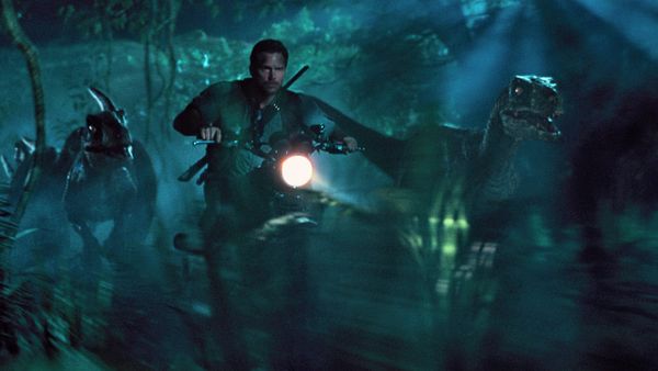 This photo, provided by Universal Pictures, shows Chris Pratt as Owen leading the raptors on a mission in a scene from the film Jurassic World. - Sputnik International