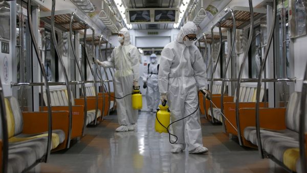 Workers in full protective gear disinfect the interior of a subway train at a Seoul Metro's railway vehicle base in Goyang, South Korea, June 9, 2015 Workers in full protective gear disinfect the interior of a subway train at a Seoul Metro's railway vehicle base in Goyang, South Korea, June 9, 2015 - Sputnik International