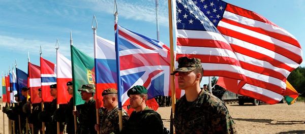 Soldiers from NATO countries attend a opening ceremony of military exercise 'Saber Strike 2015' - Sputnik International
