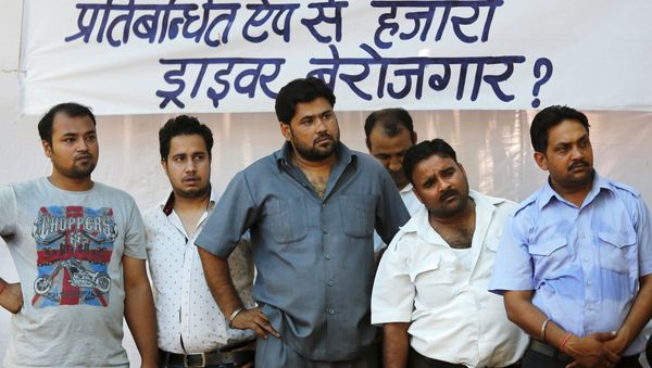 Taxi-drivers listen to a speaker during a protest in New Delhi, India, June 8, 2015 Taxi-drivers listen to a speaker during a protest in New Delhi, India, June 8, 2015 - Sputnik International