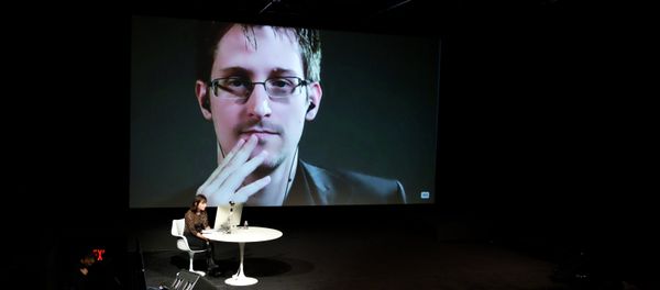 Edward Snowden talks with Jane Mayer via satellite at the 15th Annual New Yorker Festival on Saturday, Oct. 11, 2014 in New York - Sputnik International