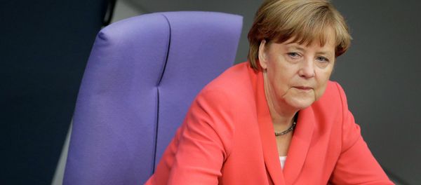 German Chancellor Angela Merkel listens to a debate of the German federal parliament, Bundestag, in Berlin, Germany, Thursday, June 18, 2015 German Chancellor Angela Merkel listens to a debate of the German federal parliament, Bundestag, in Berlin, Germany, Thursday, June 18, 2015 - Sputnik International