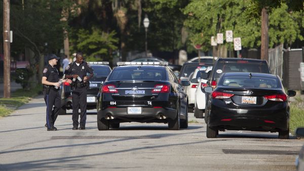 Charleston police man a barricade behind the Emanuel African Methodist Episcopal Church in Charleston, South Carolina, June 18, 2015 Charleston police man a barricade behind the Emanuel African Methodist Episcopal Church in Charleston, South Carolina, June 18, 2015 - Sputnik International