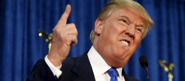 Republican presidential candidate Donald Trump gestures and declares You're fired! at a rally in Manchester, New Hampshire Republican presidential candidate Donald Trump gestures and declares You're fired! at a rally in Manchester, New Hampshire - Sputnik International