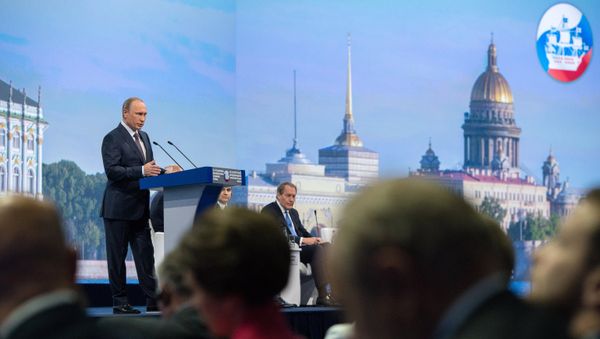 Russian President Vladimir Putin speaks during a session of the St. Petersburg International Economic Forum 2015 Russian President Vladimir Putin speaks during a session of the St. Petersburg International Economic Forum 2015 - Sputnik International