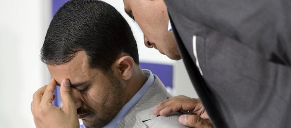 Head of the Yemeni Ansarullah rebel's delegation Hamza al-Houthi (L) gestures during a press conference on Yemen peace talks in Geneva on June 18, 2015 - Sputnik International