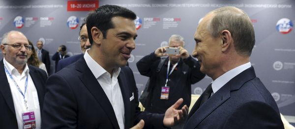 Greek Prime Minister Alexis Tsipras (L) speaks with Russian President Vladimir Putin during a session of the St. Petersburg International Economic Forum 2015 (SPIEF 2015) in St. Petersburg, Russia, June 19, 2015 Greek Prime Minister Alexis Tsipras (L) speaks with Russian President Vladimir Putin during a session of the St. Petersburg International Economic Forum 2015 (SPIEF 2015) in St. Petersburg, Russia, June 19, 2015 - Sputnik International