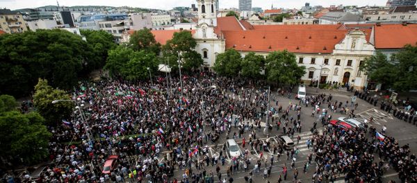 Participants gather during an anti-immigration rally organised by an initiative called Stop Islamisation of Europe and backed by the far-right People's Party-Our Slovakia in Bratislava, Slovakia Participants gather during an anti-immigration rally organised by an initiative called Stop Islamisation of Europe and backed by the far-right People's Party-Our Slovakia in Bratislava, Slovakia - Sputnik International
