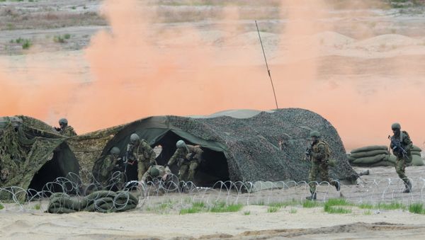 Soldiers take part in the NATO Noble Jump exercise on a training range near Swietoszow Zagan, Poland, Thursday, June 18, 2015 Soldiers take part in the NATO Noble Jump exercise on a training range near Swietoszow Zagan, Poland, Thursday, June 18, 2015 - Sputnik International