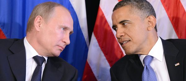 US President Barack Obama (R) listens to Russian President Vladimir Putin - Sputnik International