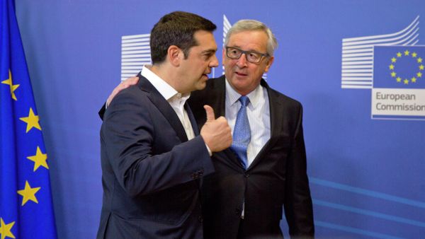 Greek Prime Minister Alexis Tsipras, left, speaks with European Commission President Jean-Claude Juncker as he arrives for a meeting prior to an EU summit at EU headquarters in Brussels Greek Prime Minister Alexis Tsipras, left, speaks with European Commission President Jean-Claude Juncker as he arrives for a meeting prior to an EU summit at EU headquarters in Brussels - Sputnik International