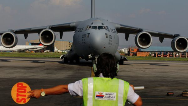 A US Air Force Boeing C-17 Globemaster III lands in Tribhuvan International Airport in Kathmandu, Nepal. - Sputnik International