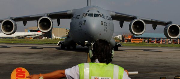 A US Air Force Boeing C-17 Globemaster III lands in Tribhuvan International Airport in Kathmandu, Nepal. - Sputnik International
