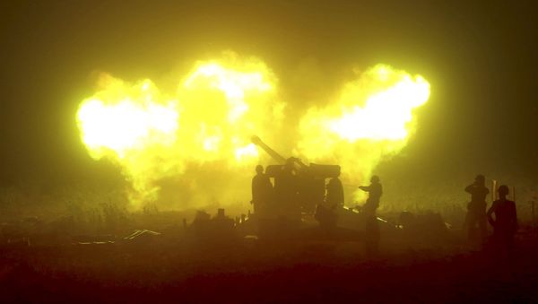 A night drill of ground artillery sub-units is seen in this undated photo released by North Korea's Korean Central News Agency (KCNA) on June 16, 2015 - Sputnik International